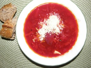 Vegetable soup topped with sour cream